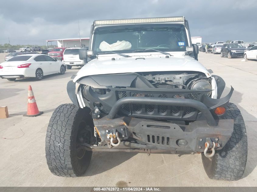 2013 Jeep Wrangler Sport VIN: 1C4GJWAGXDL670251 Lot: 40762872