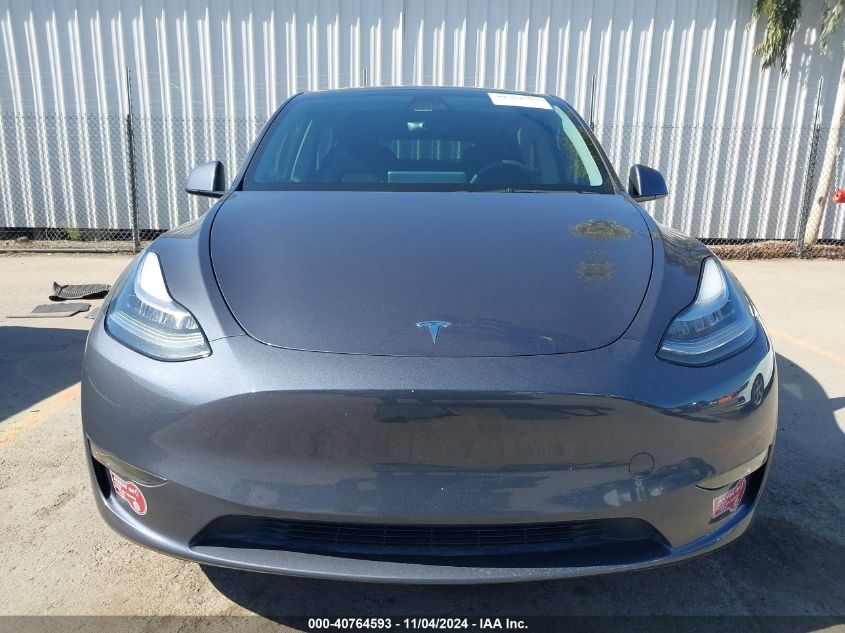 2023 Tesla Model Y Awd/Long Range Dual Motor All-Wheel Drive VIN: 7SAYGDEE0PA082169 Lot: 40764593