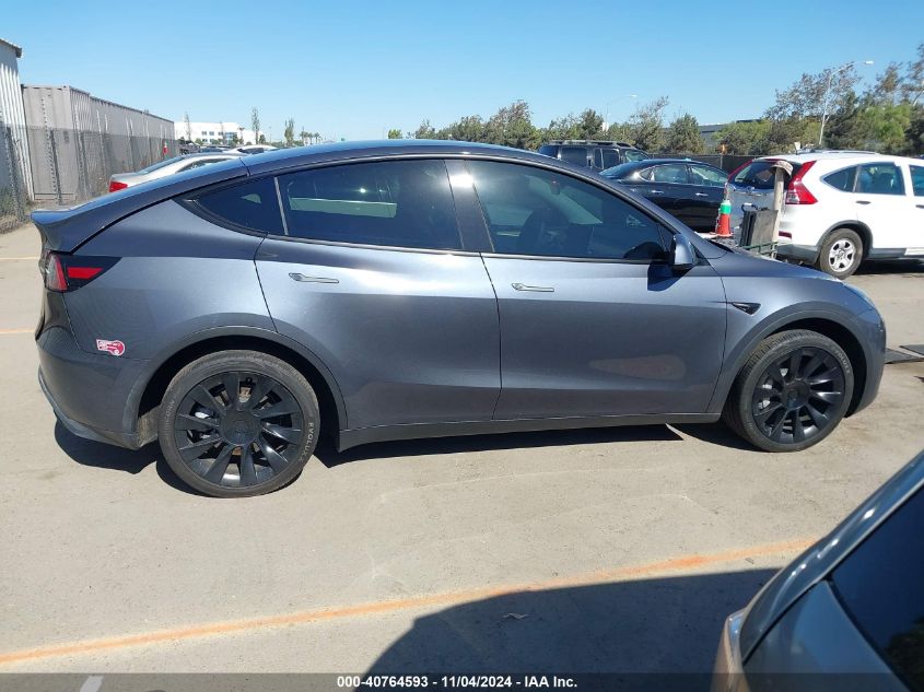 2023 Tesla Model Y Awd/Long Range Dual Motor All-Wheel Drive VIN: 7SAYGDEE0PA082169 Lot: 40764593