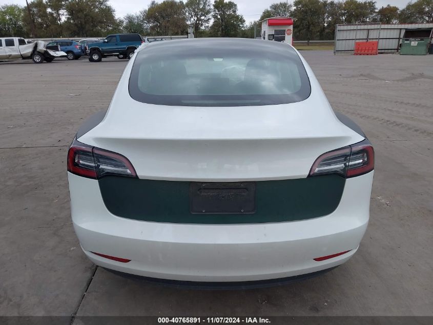 2023 Tesla Model 3 Long Range Dual Motor All-Wheel Drive VIN: 5YJ3E1EB3PF392823 Lot: 40765891