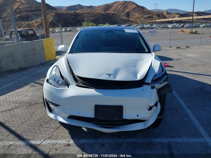 2018 Tesla Model 3 Long Range/Mid Range VIN: 5YJ3E1EA3JF025113 Lot: 40766729