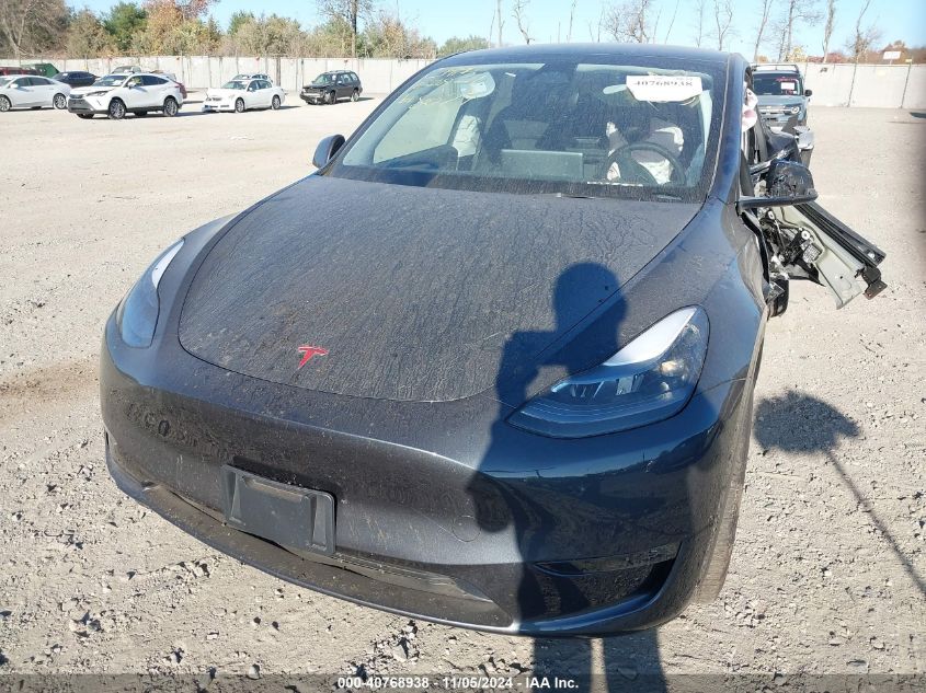 2024 Tesla Model Y Long Range Dual Motor All-Wheel Drive VIN: 7SAYGDEE0RA326048 Lot: 40768938