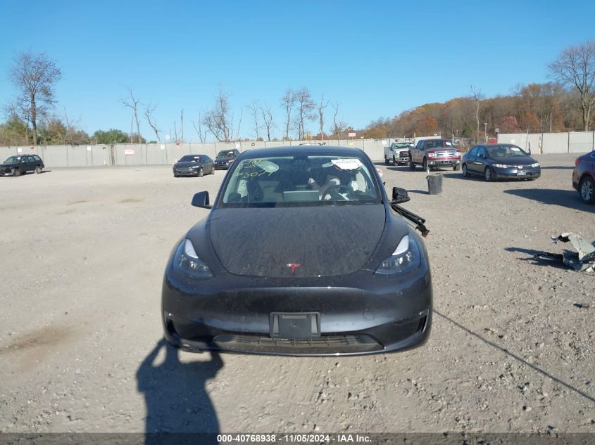 2024 Tesla Model Y Long Range Dual Motor All-Wheel Drive VIN: 7SAYGDEE0RA326048 Lot: 40768938