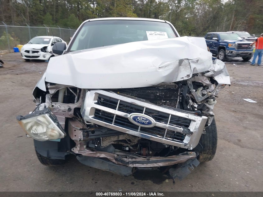 2011 Ford Escape Xls VIN: 001FMCU06BKA99534 Lot: 40769803