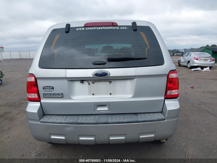 2011 Ford Escape Xls VIN: 001FMCU06BKA99534 Lot: 40769803