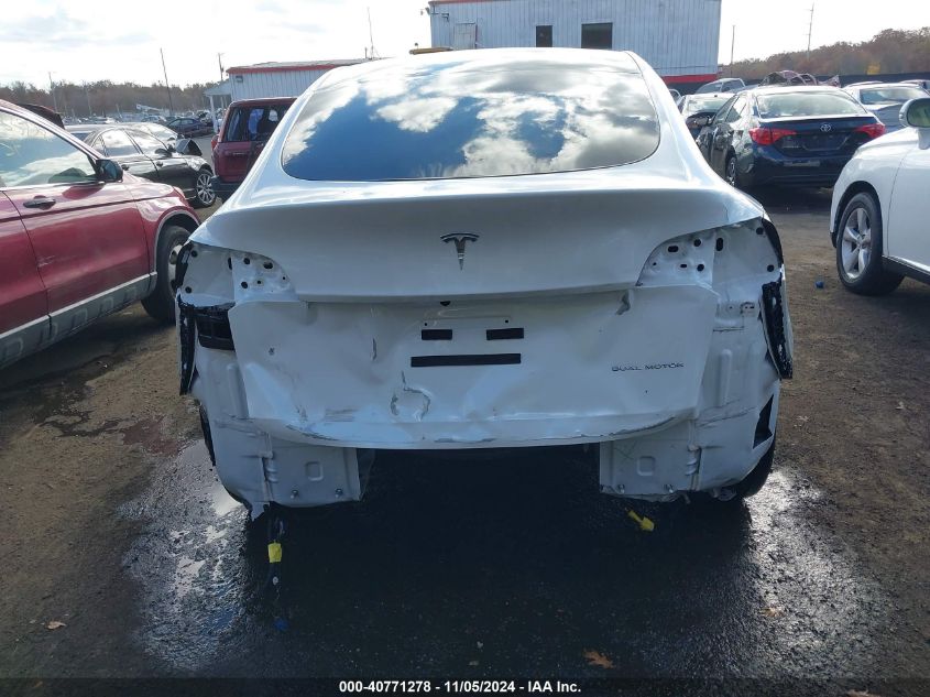 2023 Tesla Model Y Awd/Long Range Dual Motor All-Wheel Drive VIN: 7SAYGDEE8PF692744 Lot: 40771278