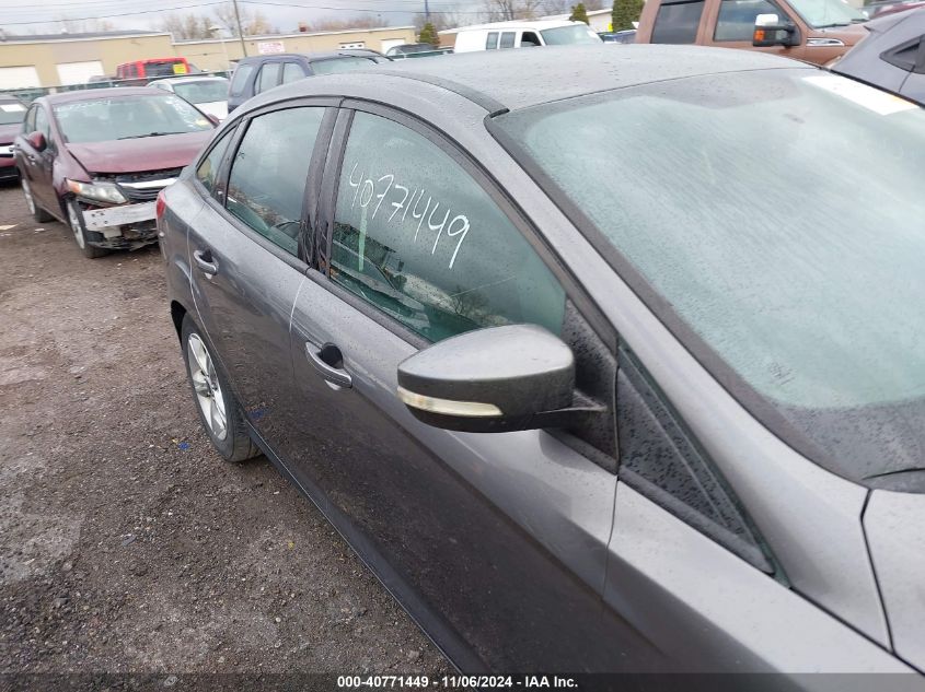 2014 Ford Focus Se VIN: 1FADP3F29EL310635 Lot: 40771449