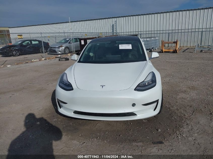 2018 Tesla Model 3 Long Range/Mid Range VIN: 5YJ3E1EA9JF063431 Lot: 40771943