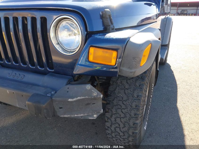 2002 Jeep Wrangler Se VIN: 1J4FA29P82P752004 Lot: 40774169