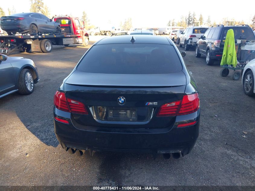 2014 BMW M5 VIN: WBSFV9C59ED594023 Lot: 40775431