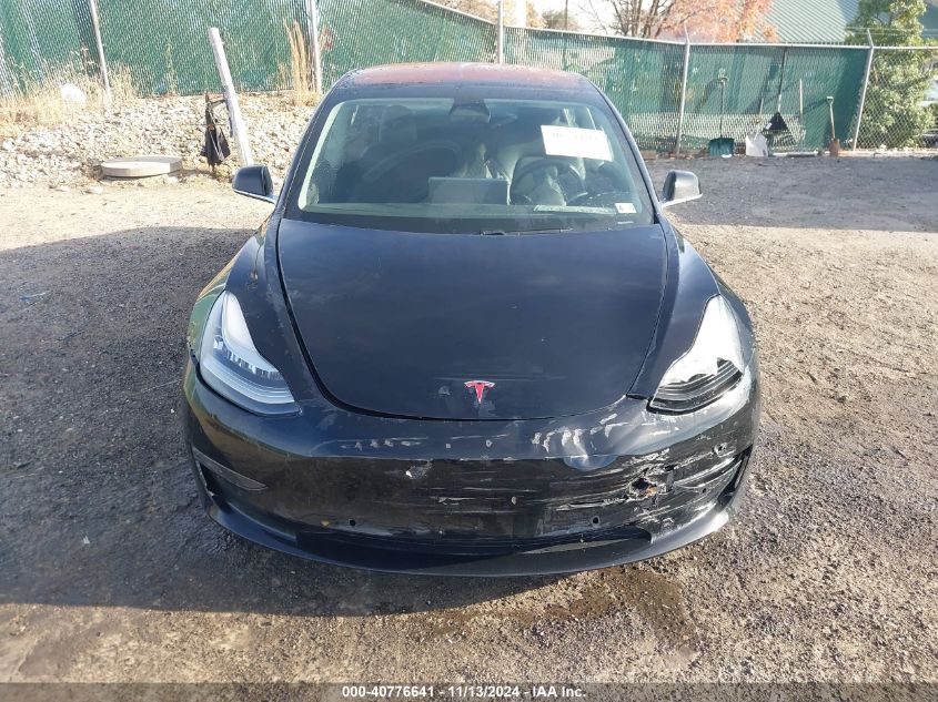 2018 Tesla Model 3 Long Range/Performance VIN: 5YJ3E1EB9JF129744 Lot: 40776641