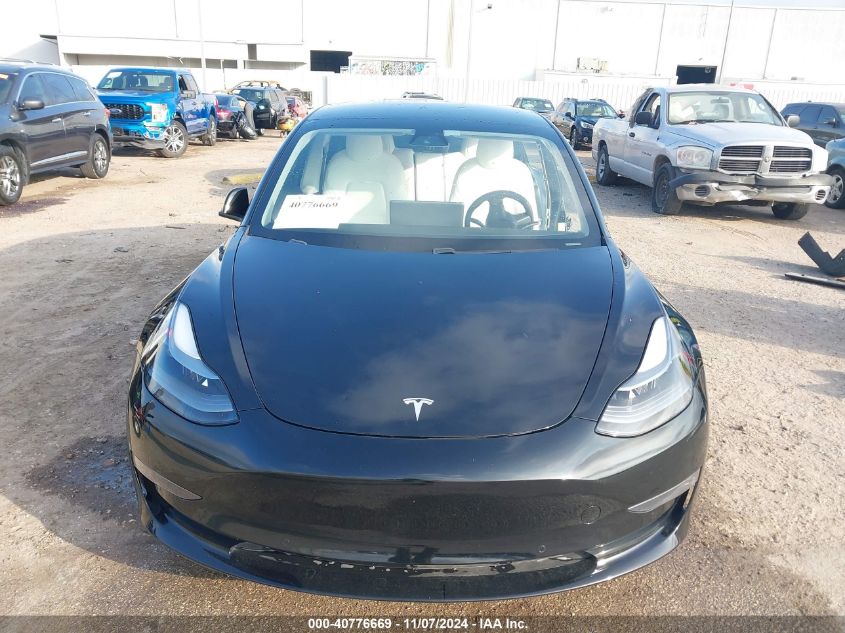 2021 Tesla Model 3 Standard Range Plus Rear-Wheel Drive VIN: 5YJ3E1EA7MF987340 Lot: 40776669