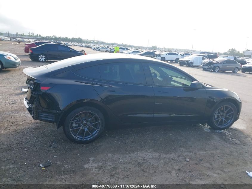 2021 Tesla Model 3 Standard Range Plus Rear-Wheel Drive VIN: 5YJ3E1EA7MF987340 Lot: 40776669