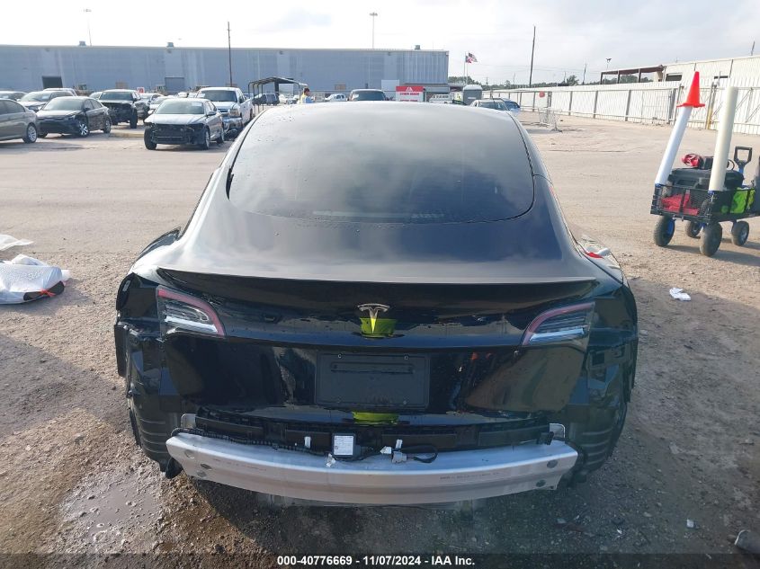 2021 Tesla Model 3 Standard Range Plus Rear-Wheel Drive VIN: 5YJ3E1EA7MF987340 Lot: 40776669