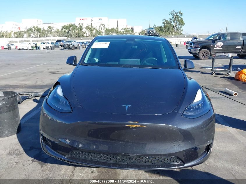 2024 Tesla Model Y Long Range Dual Motor All-Wheel Drive VIN: 7SAYGDEE8RF064850 Lot: 40777308