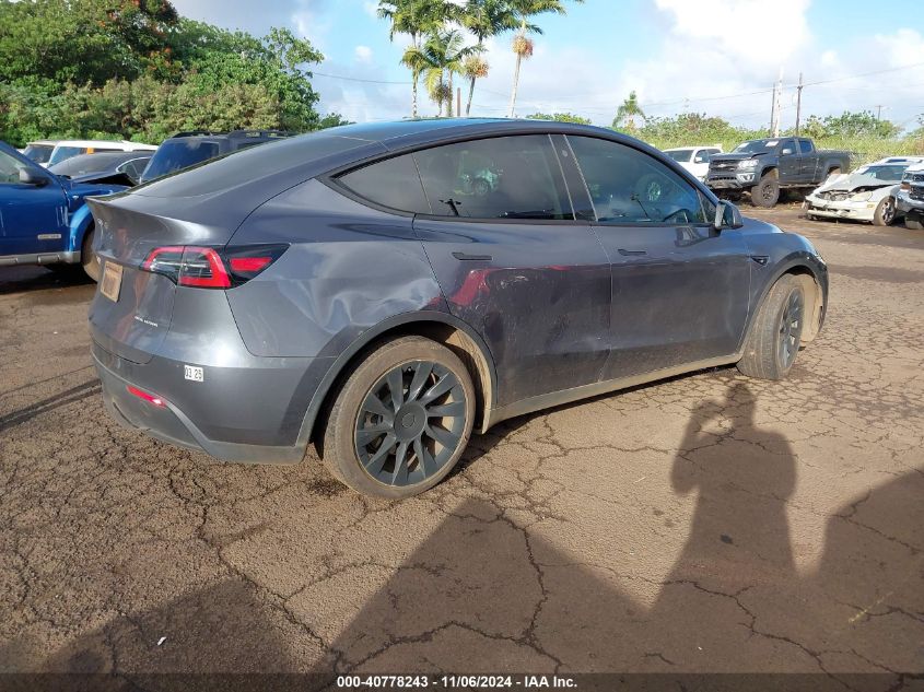 VIN 7SAYGDEE9PF698097 2023 TESLA MODEL Y no.4