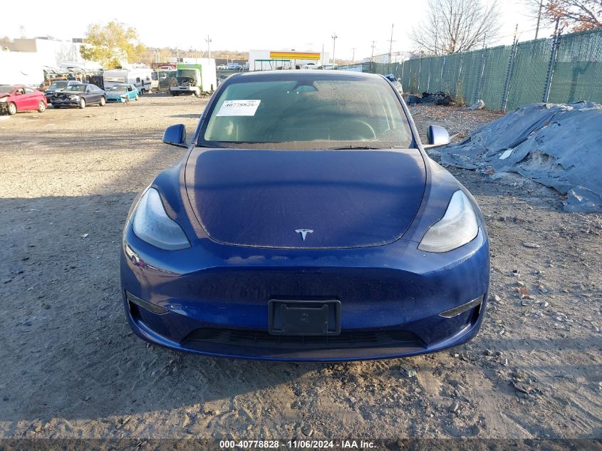 2023 Tesla Model Y Awd/Long Range Dual Motor All-Wheel Drive VIN: 7SAYGAEE6PF849217 Lot: 40778828