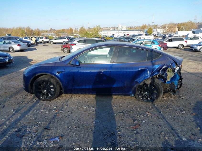 2023 Tesla Model Y Awd/Long Range Dual Motor All-Wheel Drive VIN: 7SAYGAEE6PF849217 Lot: 40778828