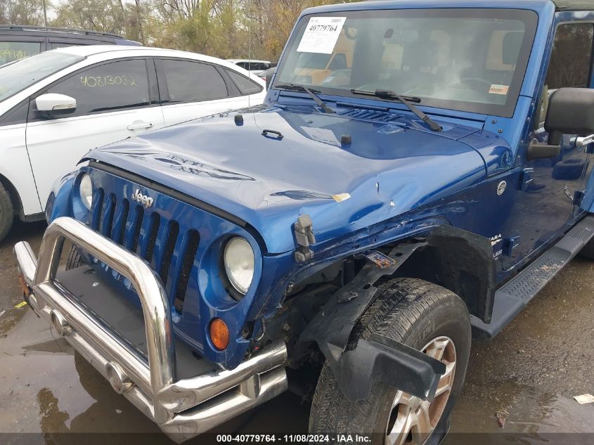 2010 Jeep Wrangler Unlimited Sahara VIN: 1J4BA5H18AL128089 Lot: 40779764