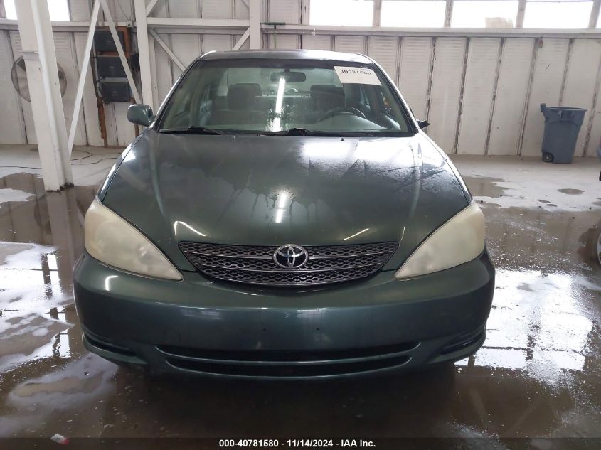 2004 Toyota Camry Le VIN: JTDBE32KX40267484 Lot: 40781580