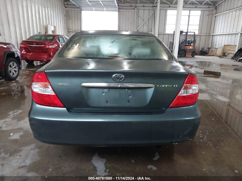 2004 Toyota Camry Le VIN: JTDBE32KX40267484 Lot: 40781580