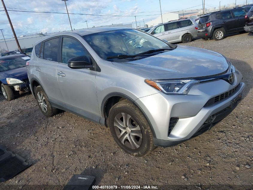 2018 Toyota Rav4 Le VIN: 2T3BFREV7JW717394 Lot: 40783879