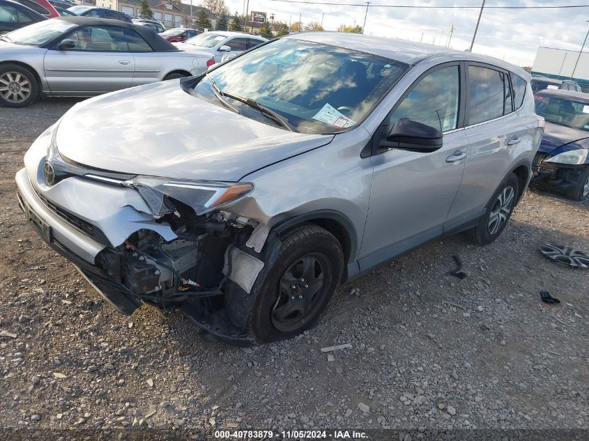 2018 Toyota Rav4 Le VIN: 2T3BFREV7JW717394 Lot: 40783879