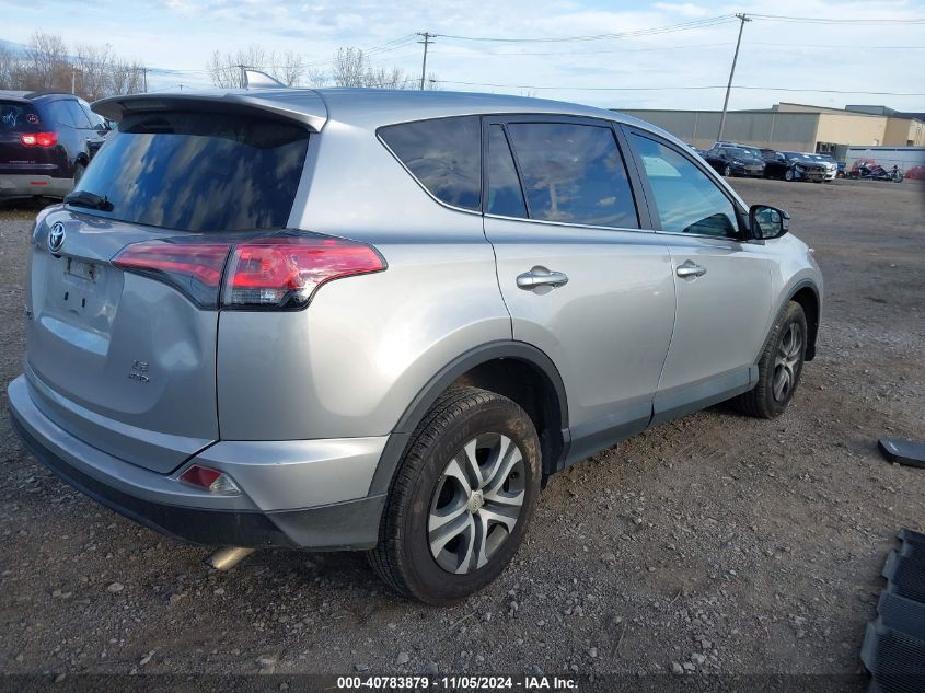 2018 Toyota Rav4 Le VIN: 2T3BFREV7JW717394 Lot: 40783879