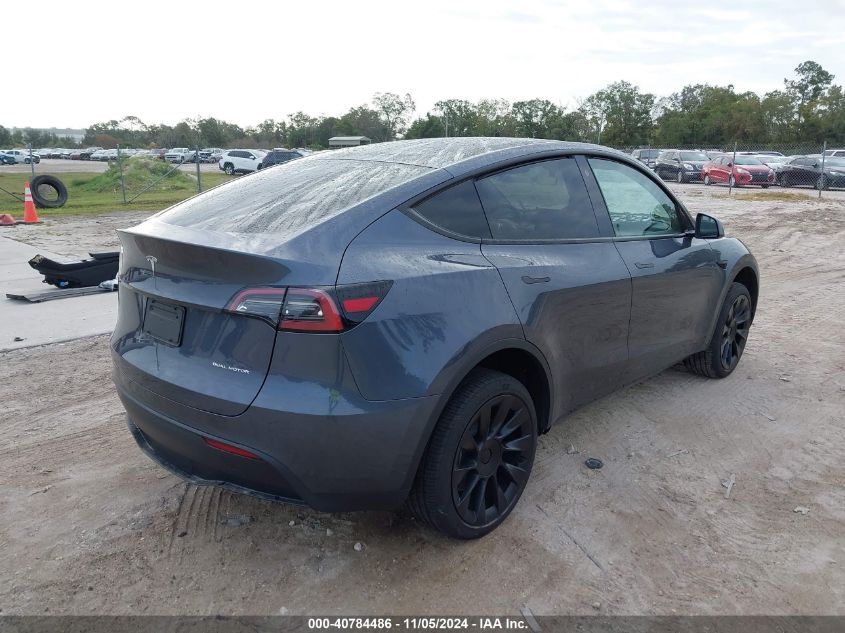 VIN 7SAYGDEE3PA127749 2023 Tesla Model Y, Awd/Long... no.4