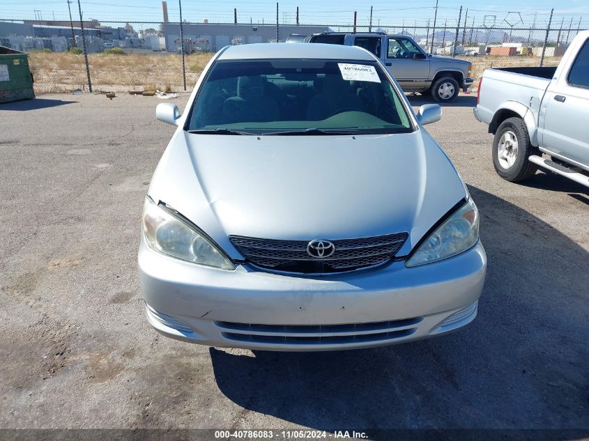 2003 Toyota Camry Le VIN: 4T1BE30K33U701086 Lot: 40786083