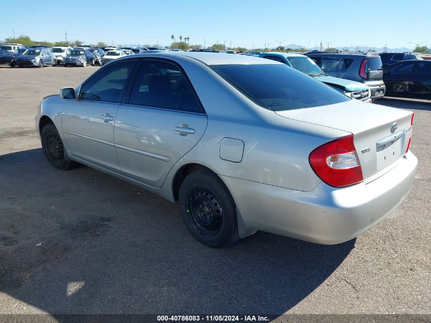 2003 Toyota Camry Le VIN: 4T1BE30K33U701086 Lot: 40786083