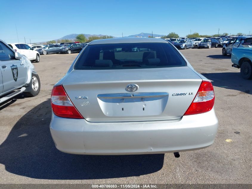 2003 Toyota Camry Le VIN: 4T1BE30K33U701086 Lot: 40786083