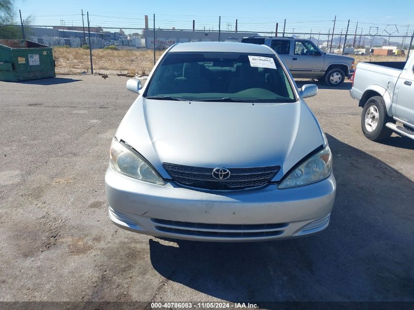 2003 Toyota Camry Le VIN: 4T1BE30K33U701086 Lot: 40786083