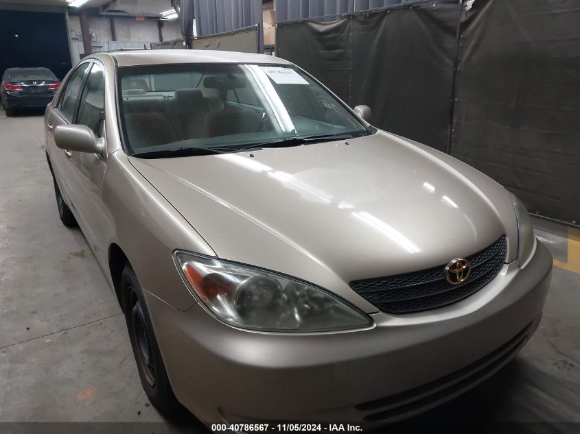 2002 Toyota Camry Le VIN: 4T1BE32K52U519627 Lot: 40786567