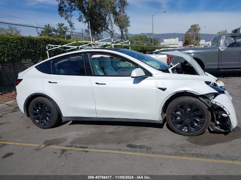 2023 Tesla Model Y Awd/Long Range Dual Motor All-Wheel Drive VIN: 7SAYGAEE6PF662625 Lot: 40788417