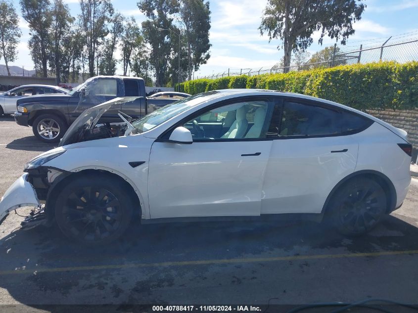 2023 Tesla Model Y Awd/Long Range Dual Motor All-Wheel Drive VIN: 7SAYGAEE6PF662625 Lot: 40788417