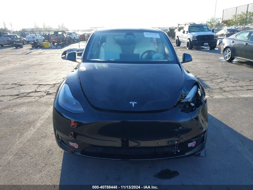 2023 Tesla Model Y Awd/Long Range Dual Motor All-Wheel Drive VIN: 7SAYGDEE9PF787698 Lot: 40788448