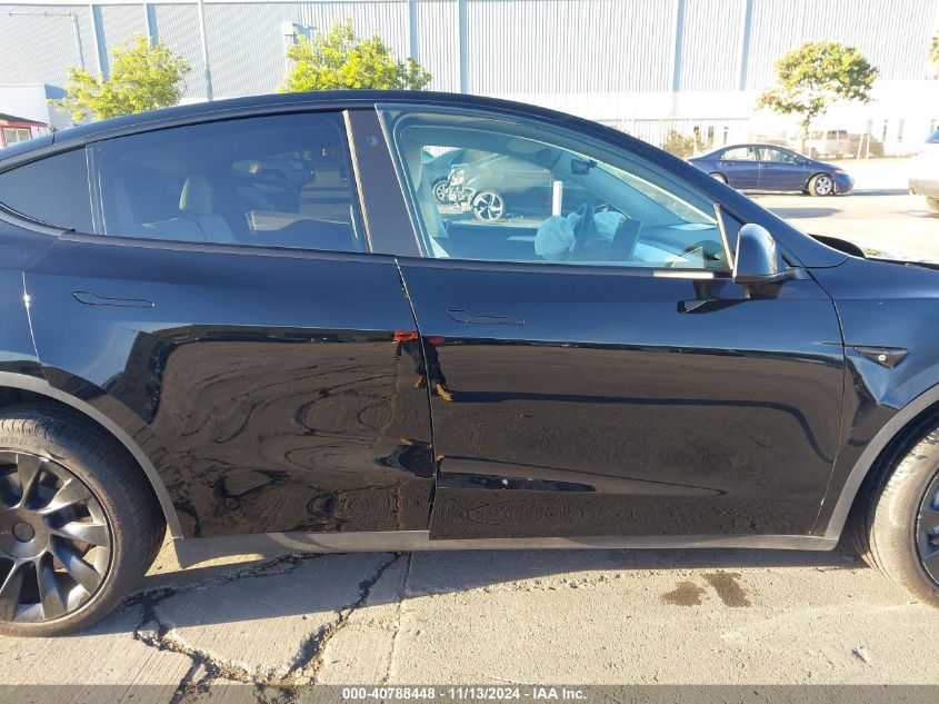 2023 Tesla Model Y Awd/Long Range Dual Motor All-Wheel Drive VIN: 7SAYGDEE9PF787698 Lot: 40788448