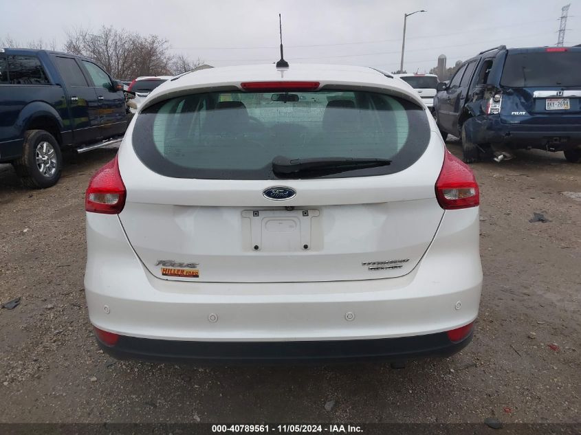 2016 Ford Focus Titanium VIN: 1FADP3N28GL242879 Lot: 40789561