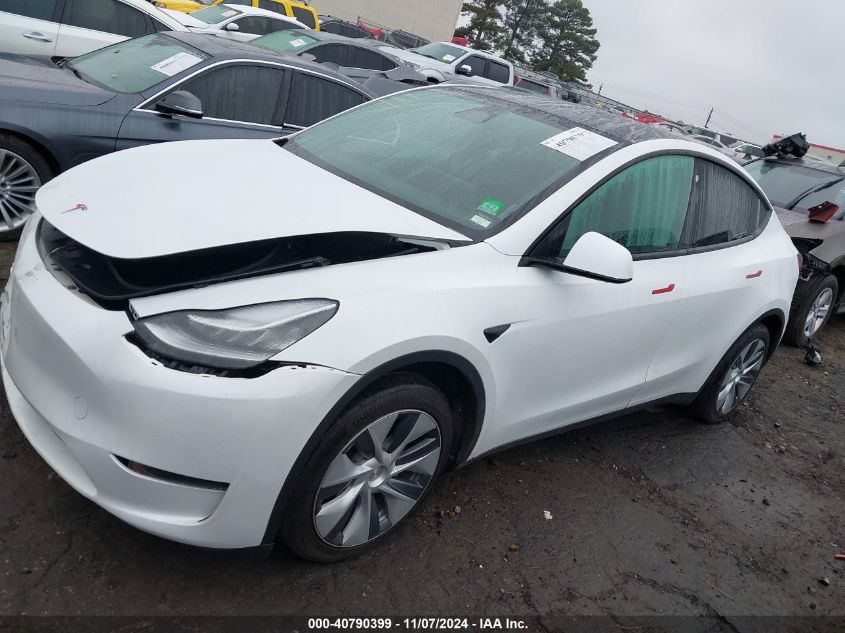 2023 Tesla Model Y Awd/Long Range Dual Motor All-Wheel Drive VIN: 7SAYGDEE4PA082028 Lot: 40790399