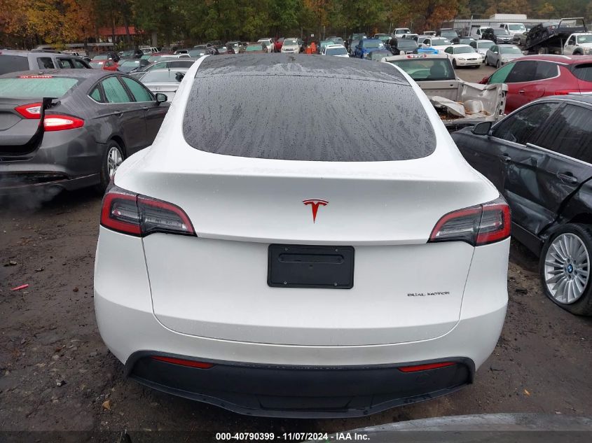 2023 Tesla Model Y Awd/Long Range Dual Motor All-Wheel Drive VIN: 7SAYGDEE4PA082028 Lot: 40790399