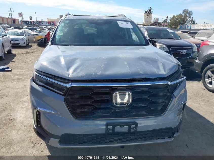 2023 Honda Pilot 2Wd Touring VIN: 5FNYG2H7XPB01142 Lot: 40791344