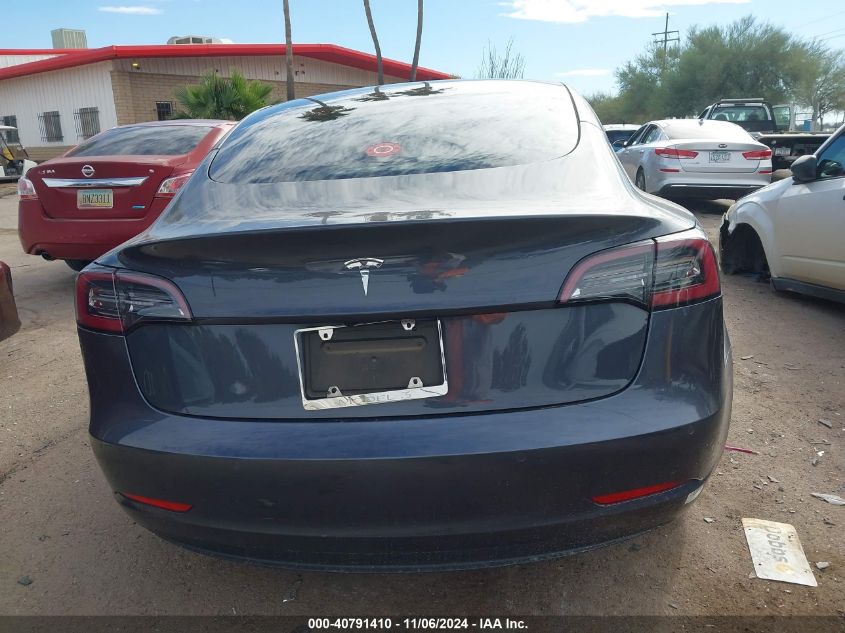 2021 Tesla Model 3 Standard Range Plus Rear-Wheel Drive VIN: 5YJ3E1EA6MF097055 Lot: 40791410