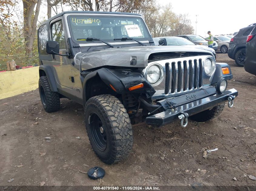 2000 Jeep Wrangler Sport VIN: 1J4FA49S3YP726659 Lot: 40791540