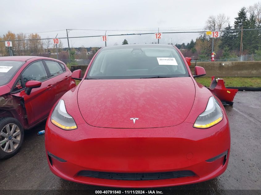 2023 Tesla Model Y Awd/Long Range Dual Motor All-Wheel Drive VIN: 7SAYGDEE6PF648872 Lot: 40791840