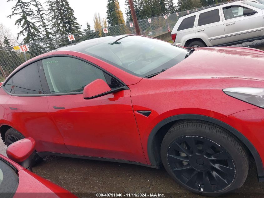 2023 Tesla Model Y Awd/Long Range Dual Motor All-Wheel Drive VIN: 7SAYGDEE6PF648872 Lot: 40791840