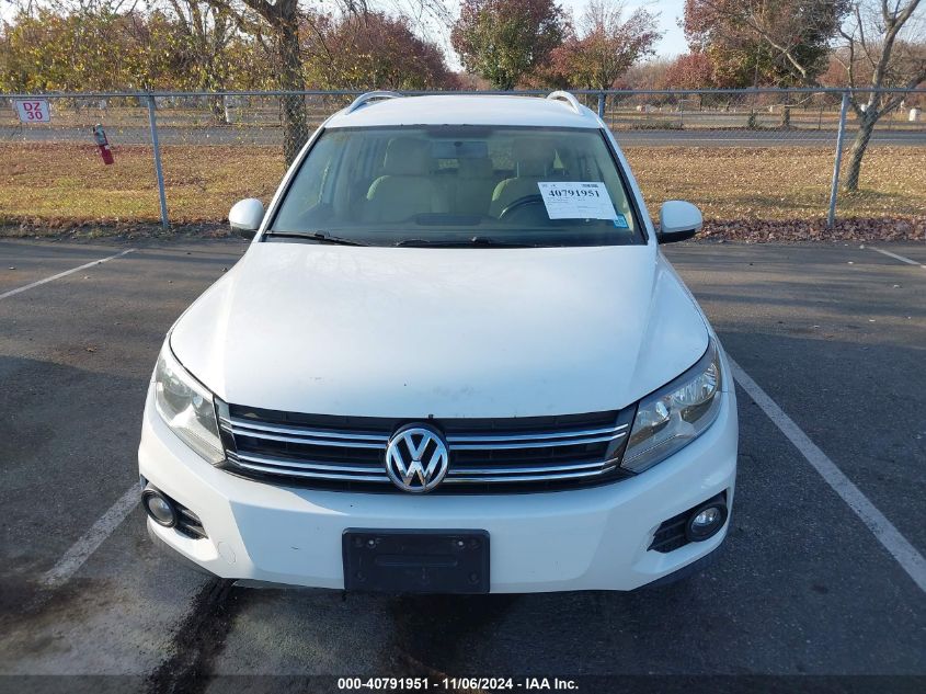 2014 Volkswagen Tiguan Se VIN: WVGBV3AXXEW568408 Lot: 40791951