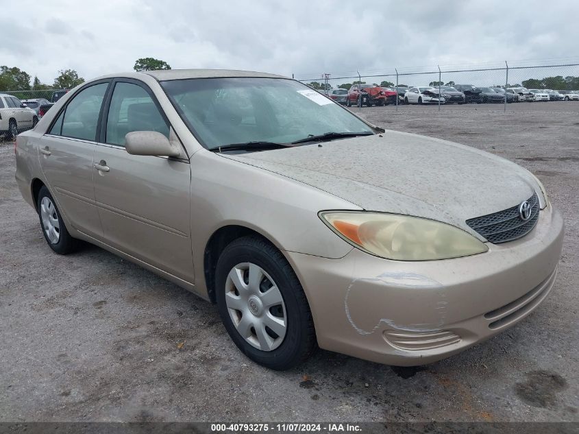 2002 Toyota Camry Le VIN: 4T1BE32K72U587489 Lot: 40793275