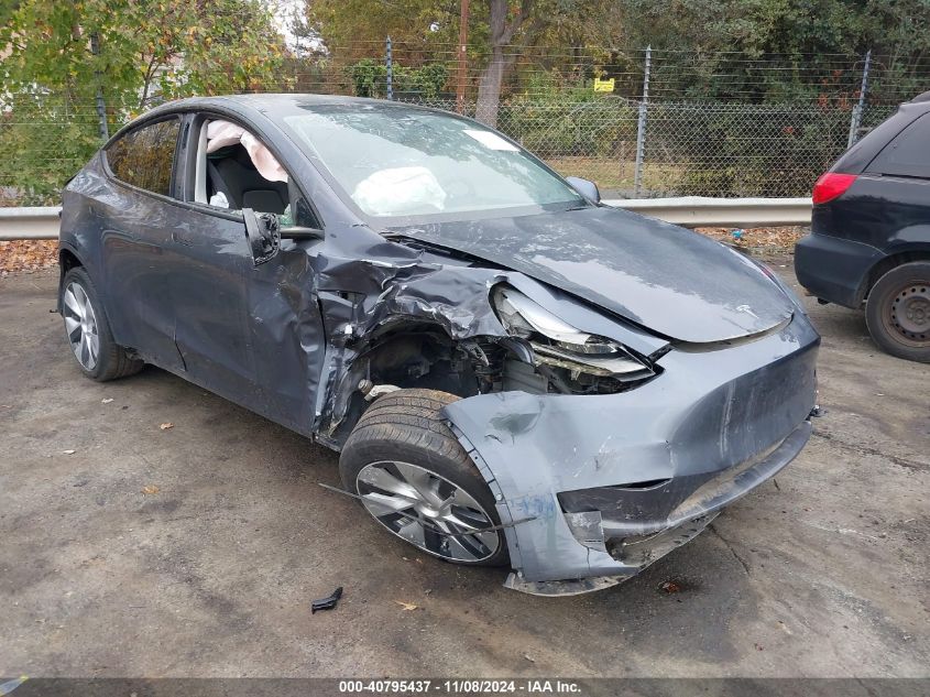 2023 Tesla Model Y Awd/Long Range Dual Motor All-Wheel Drive VIN: 7SAYGDEE5PF675299 Lot: 40795437