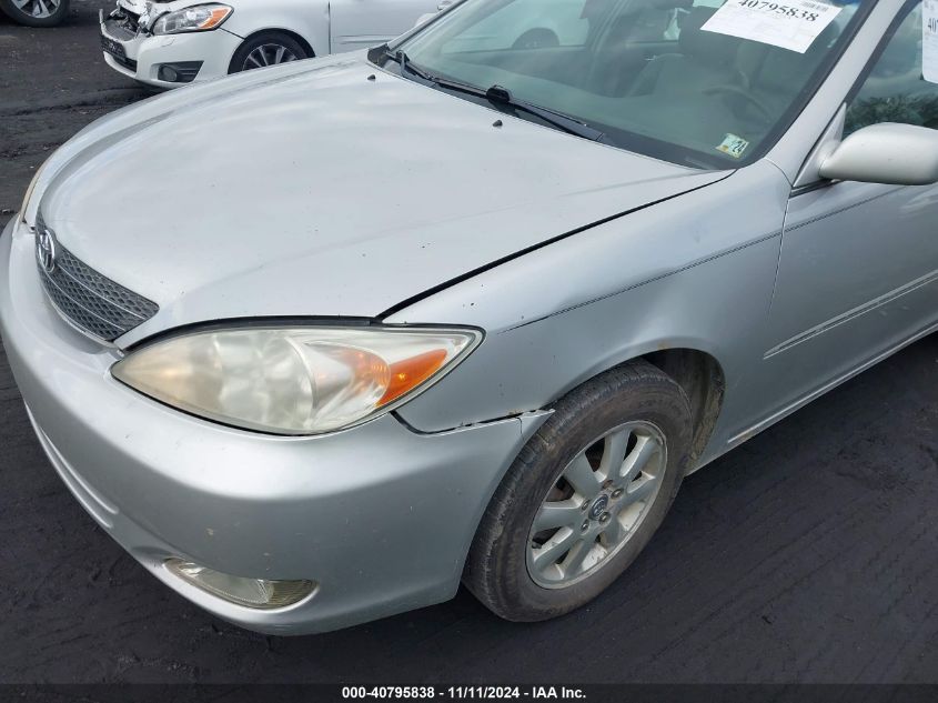 2004 Toyota Camry Xle VIN: 4T1BE30KX4U267668 Lot: 40795838